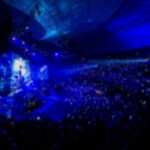 Abstract blurred background of big esports gaming event at big arena
