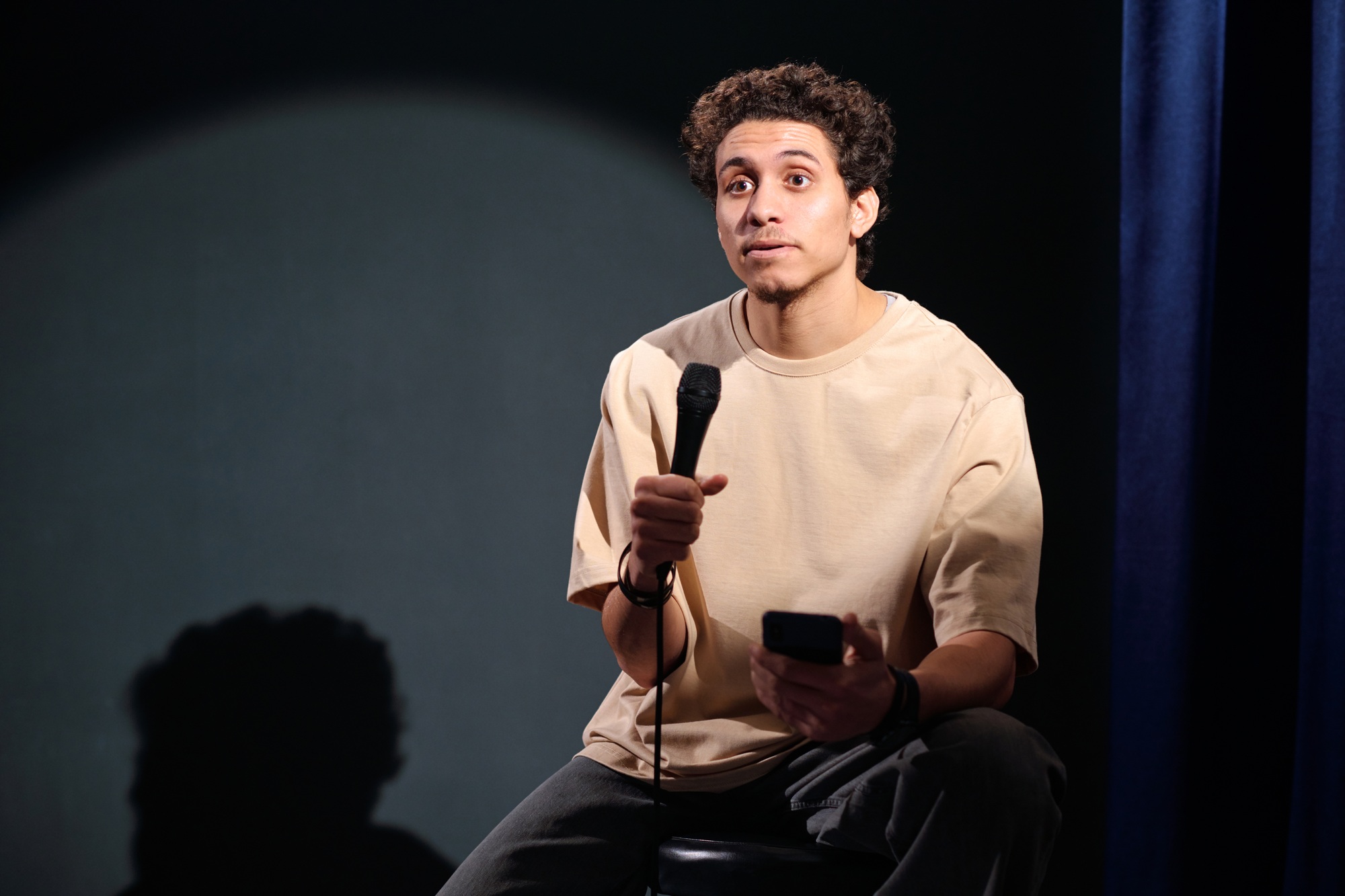 Comedian of stand up show on stage